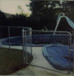Chainlink curved to go around pool.